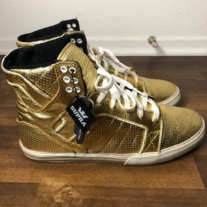 Supra gold high top shoes